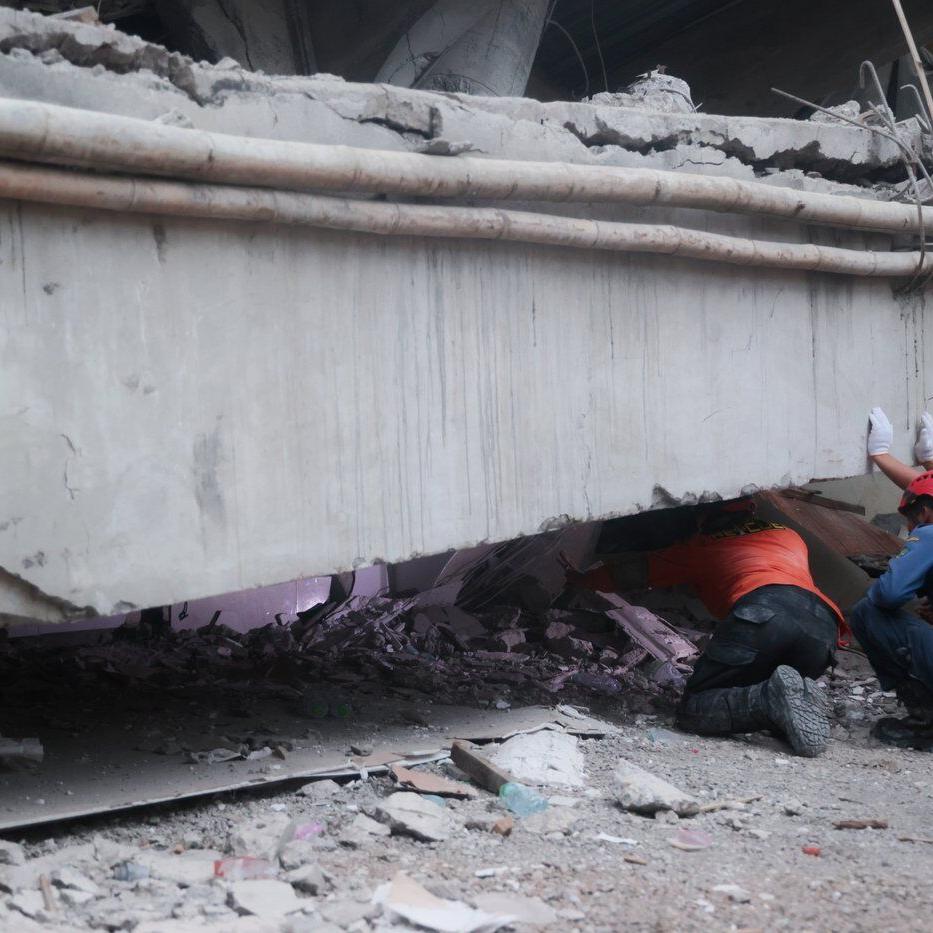 Indonesian rescuers race to find dozens of students in rubble of collapsed school